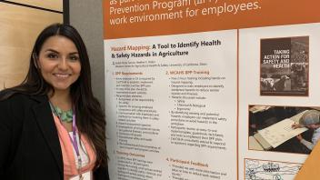Isabel Flores Garcia and her poster, Hazard Mapping: A Tool to Identify Health & Safety Hazards in Agriculture