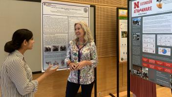Farzaneh Khorsandi discusses one of her posters about All-Terrain Vehicle Safety in Agriculture
