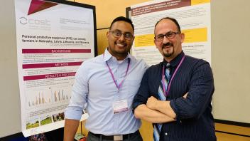 Vicente Munguia and Amjad Ramahi with their posters
