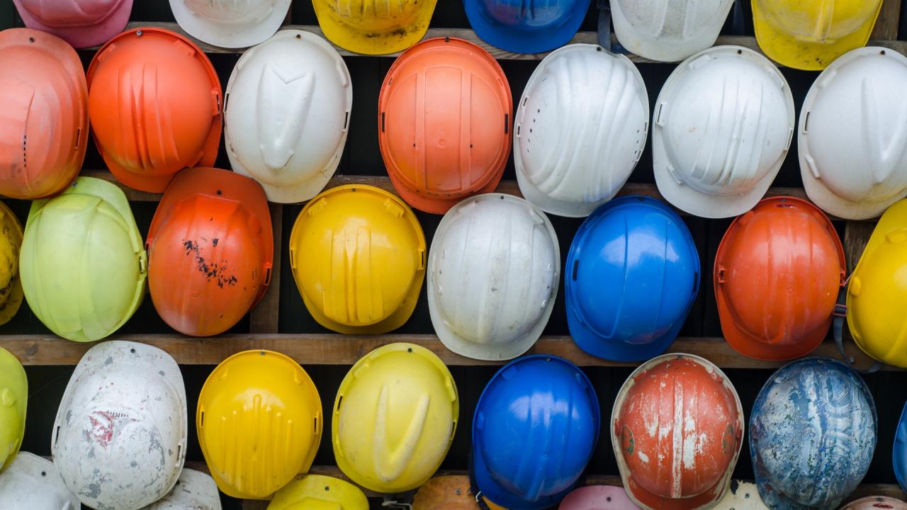 Colorful collection of construction safety helmets