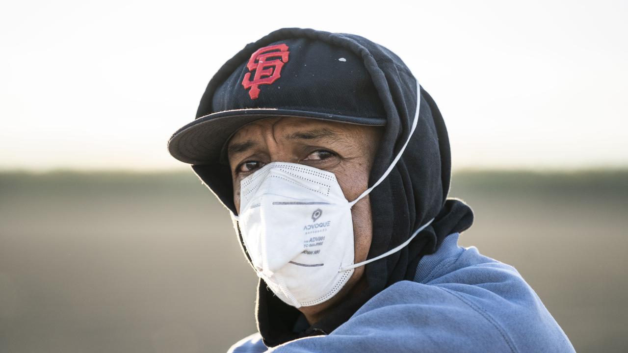 Farmworker wearing N95 respirator