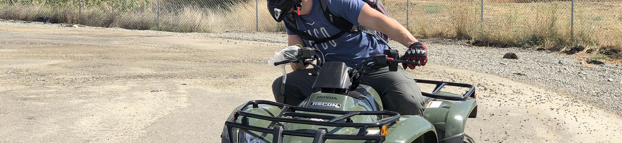 Person riding ATV